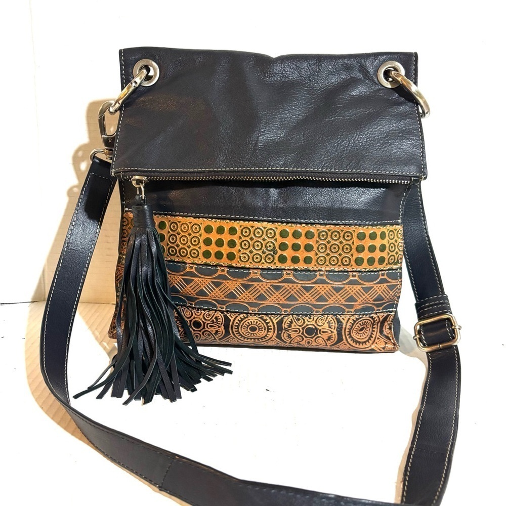 Elegant Black and Tan Crossbody Bag with Tassel